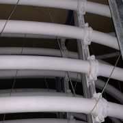 Close-up of industrial cables protected with a fire-resistant protective coating