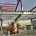 Steel structural frame under construction at a UAE warehouse project site, ready for fireproof coating application